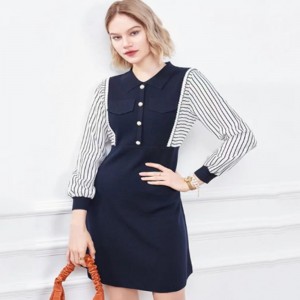 Autunno all\'inizio del piccolo colletto inverso a metà cardigan